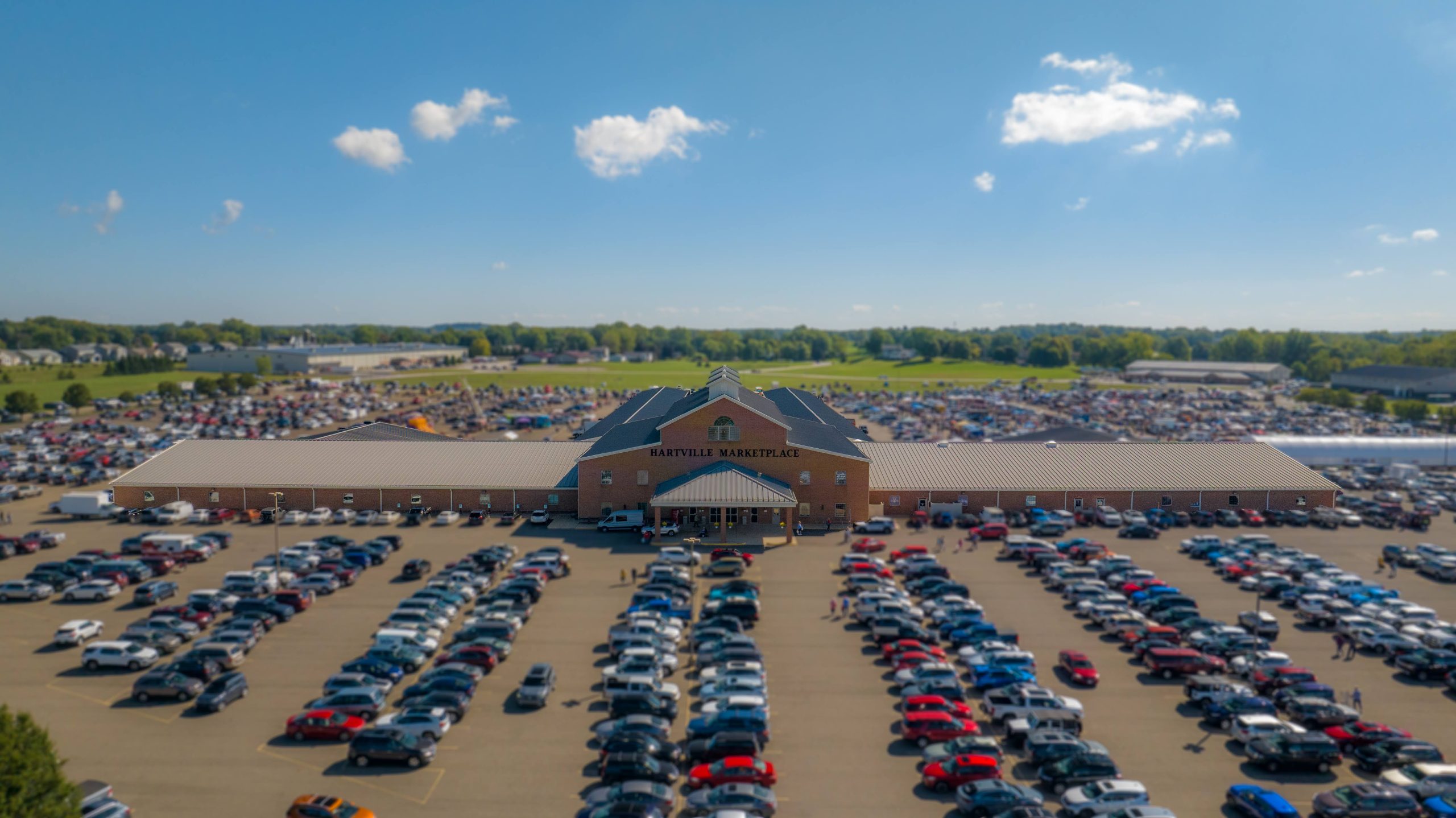 Aerial view of the Marketplace and full parking lot